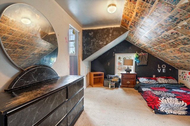 bedroom with carpet and lofted ceiling