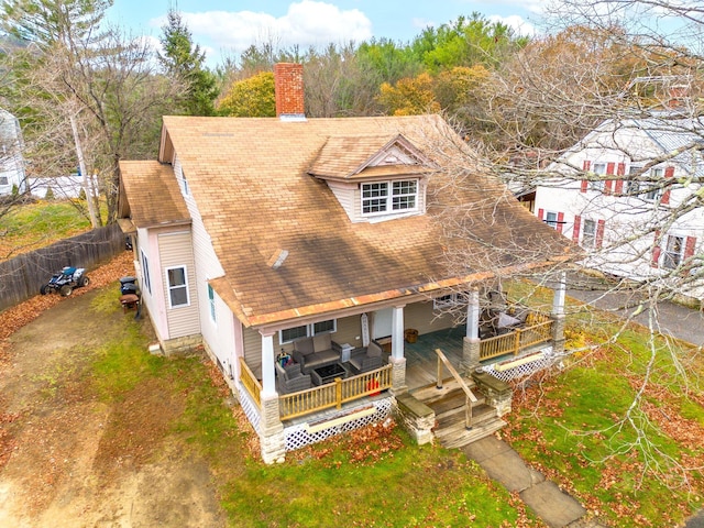 back of property with a deck