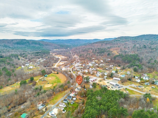 drone / aerial view featuring a mountain view