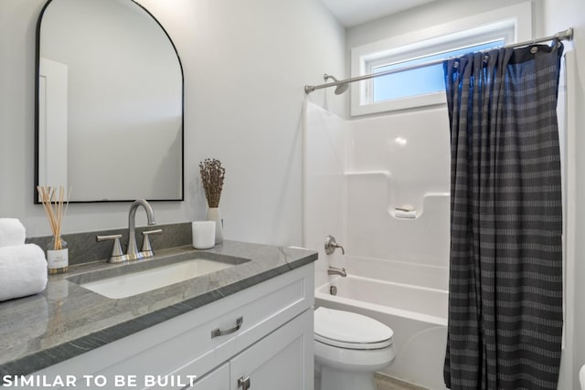 full bathroom with vanity, shower / bath combo, and toilet