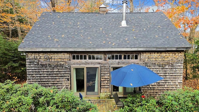 88 Piddock Ln, Fayette, ME 04349 - rear view of property with roof with shingles and a chimney
