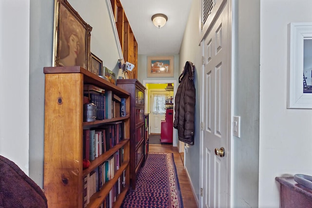 hall featuring dark wood-type flooring