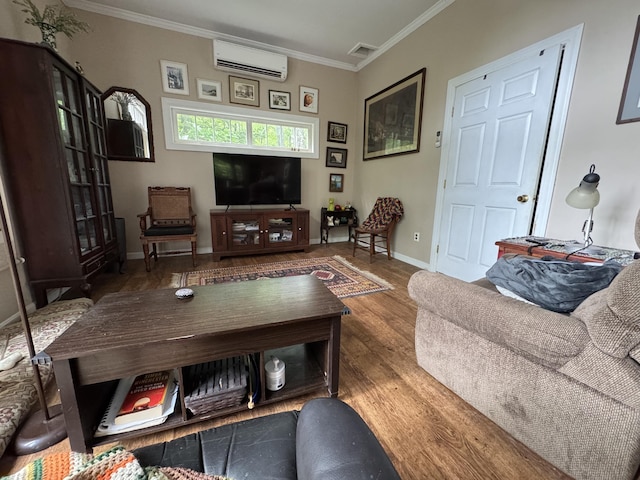 88 Piddock Ln, Fayette, ME 04349 - living room with a wall unit AC, crown molding, and wood finished floors