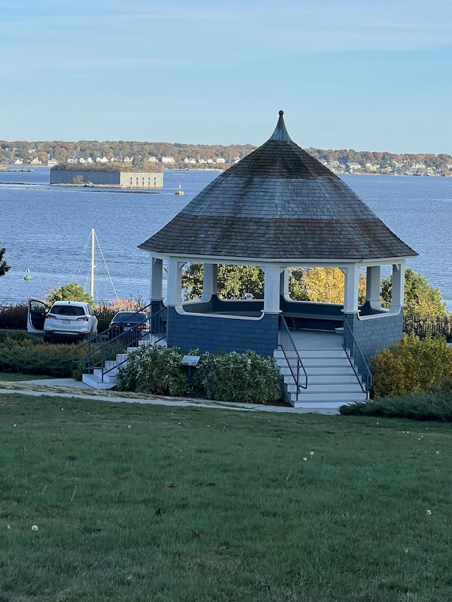 246 Eastern Promenade Promenade Unit 303, Portland, ME 04101 - back of property featuring a gazebo, stairway, a lawn, and a water view