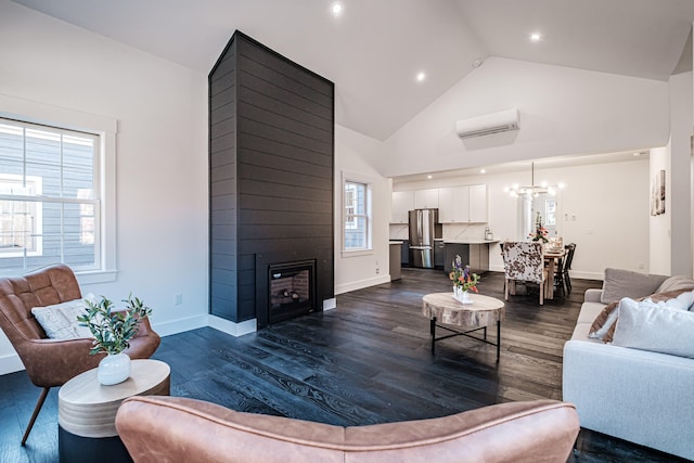 living room with high vaulted ceiling, a large fireplace, an AC wall unit, and dark wood-type flooring