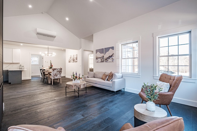 living room with high vaulted ceiling, an inviting chandelier, dark hardwood / wood-style flooring, and a wall unit AC