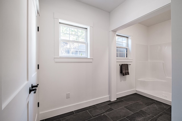 bathroom featuring walk in shower