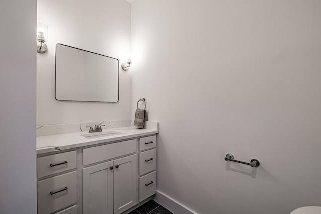 bathroom with vanity and tile patterned flooring