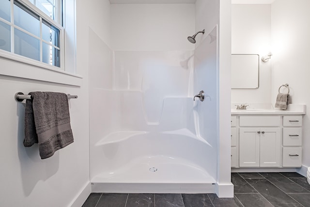 bathroom featuring vanity and walk in shower