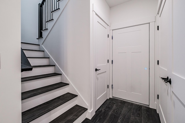 foyer with dark hardwood / wood-style flooring