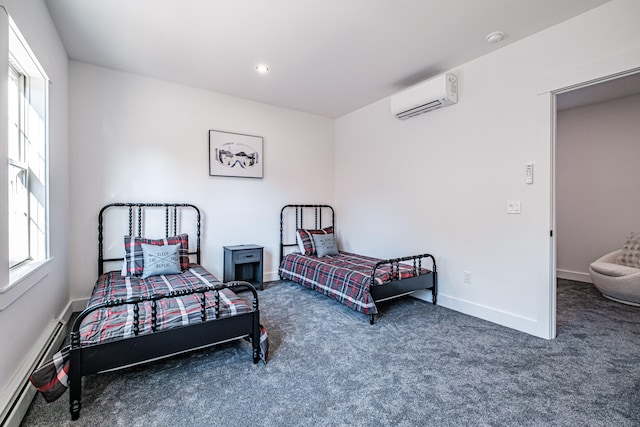 carpeted bedroom with baseboard heating and a wall unit AC