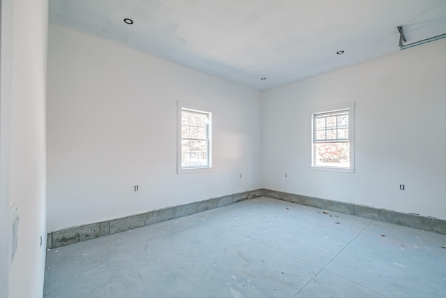 empty room featuring plenty of natural light