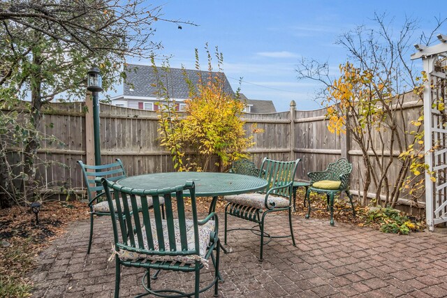 9 Robert Ln, Wells, ME 04090 - view of patio featuring fence and outdoor dining area
