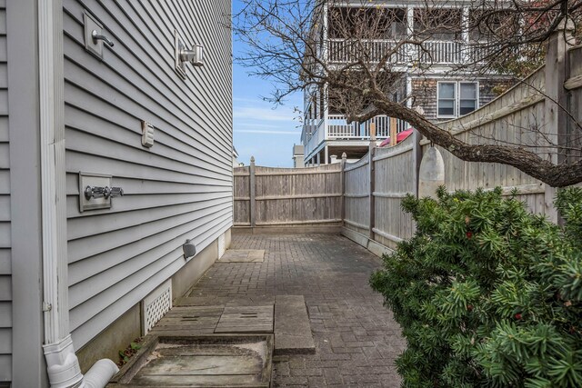 9 Robert Ln, Wells, ME 04090 - view of property exterior featuring fence and crawl space