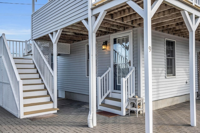 doorway to property with a patio