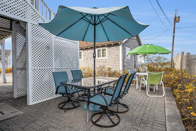 9 Robert Ln, Wells, ME 04090 - view of patio with outdoor dining space and fence