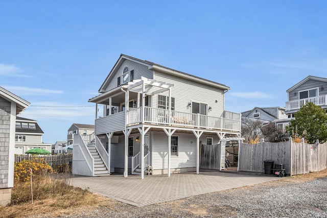 view of front of property with a balcony