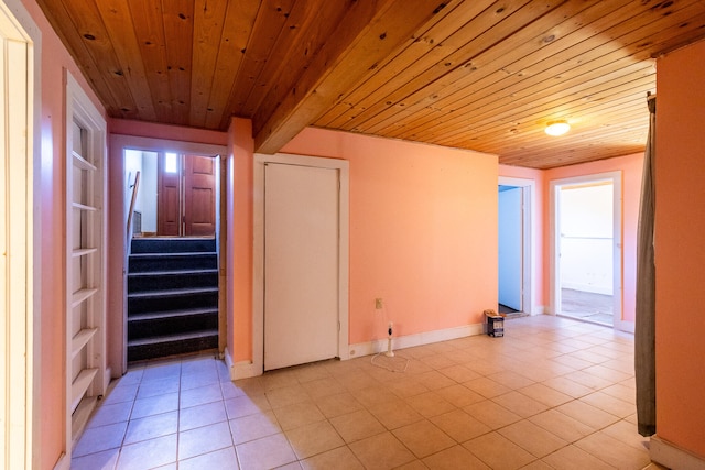 tiled empty room with wooden ceiling