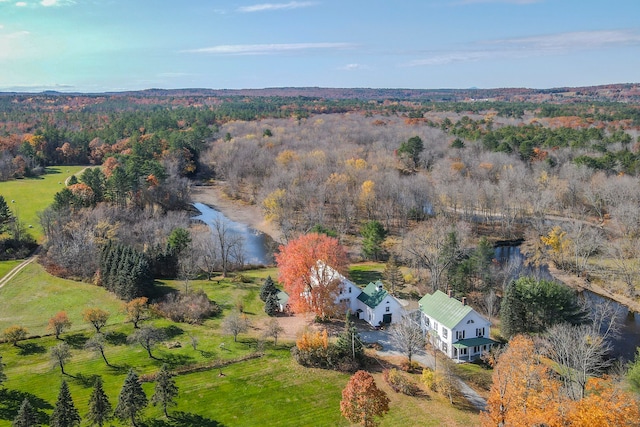 birds eye view of property featuring a water view and a rural view