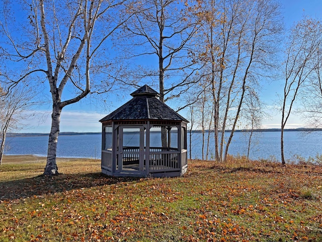 dock area with a gazebo and a water view