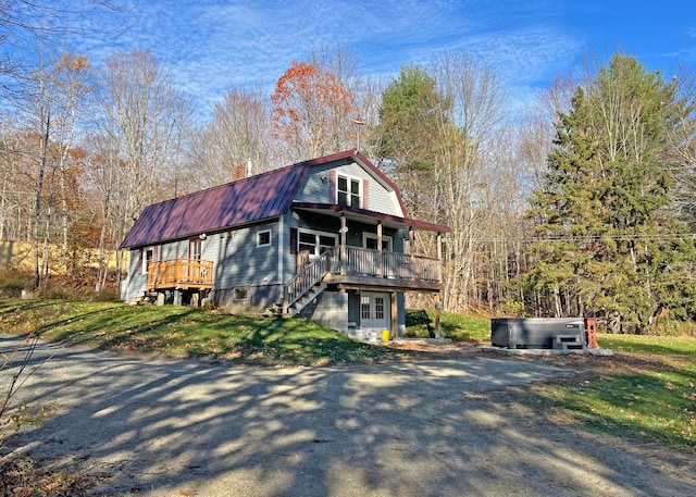 view of front of property featuring a deck