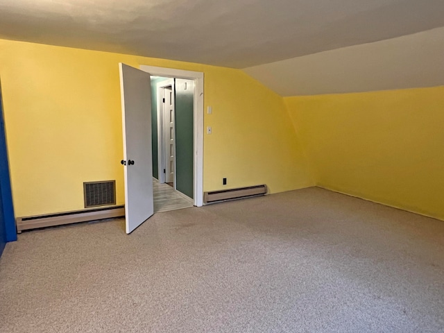 bonus room with baseboard heating, lofted ceiling, and carpet flooring