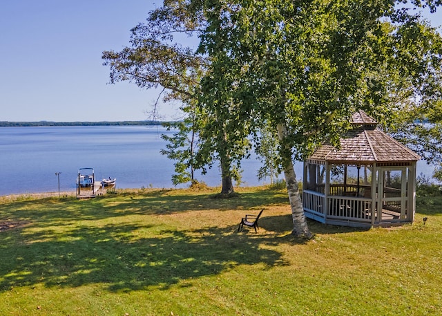 exterior space with a gazebo and a water view