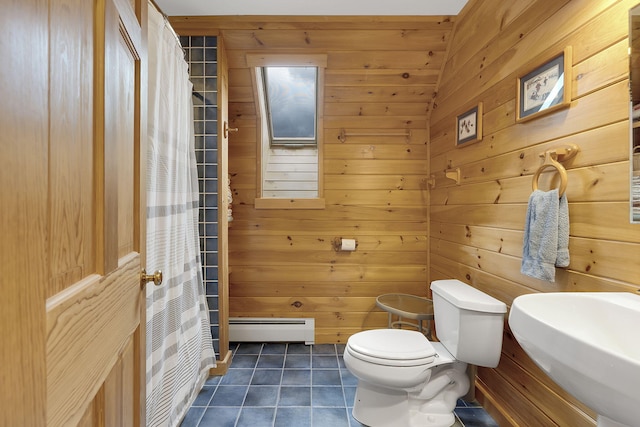 bathroom featuring tile patterned floors, a shower with curtain, wooden walls, toilet, and baseboard heating