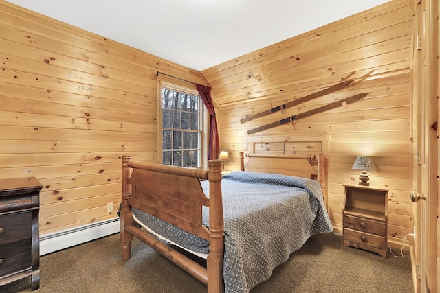 carpeted bedroom featuring a baseboard heating unit, wood walls, and lofted ceiling