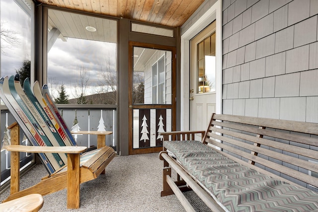 sunroom with wood ceiling