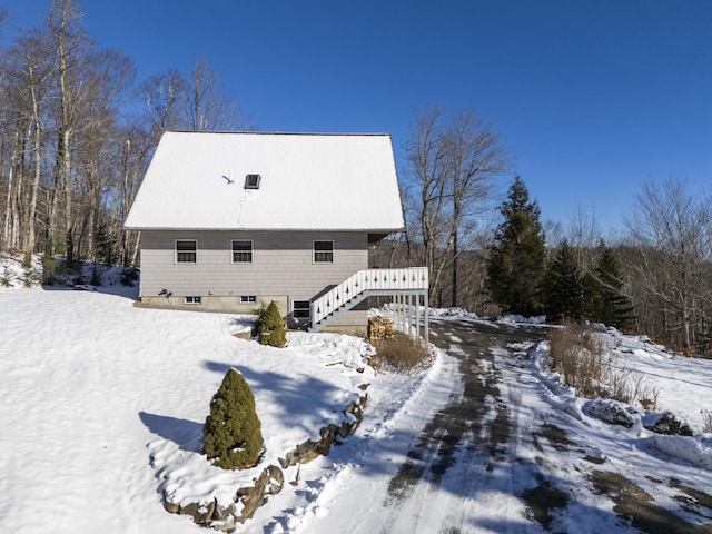 view of snow covered property