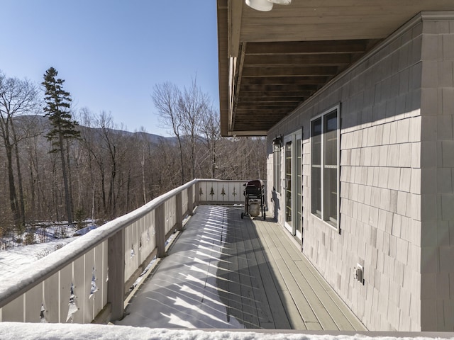 view of snow covered deck