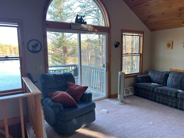 living room featuring wood ceiling, high vaulted ceiling, and carpet