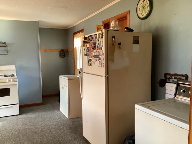 kitchen featuring washer / clothes dryer, white appliances, dark colored carpet, and ornamental molding