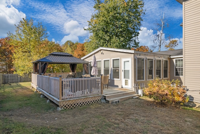 wooden terrace with a gazebo