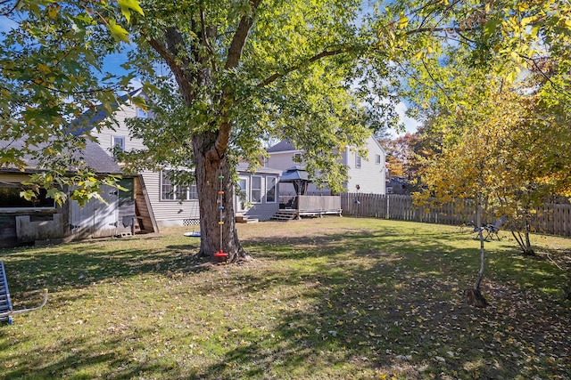 view of yard featuring a deck