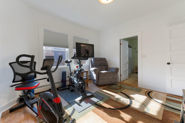 exercise area featuring light hardwood / wood-style flooring