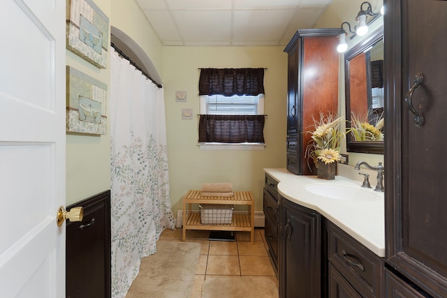 bathroom with vanity and tile patterned floors