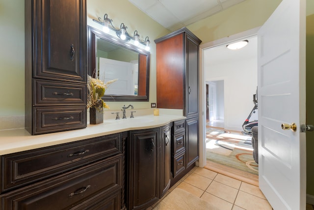 bathroom with vanity and tile patterned flooring