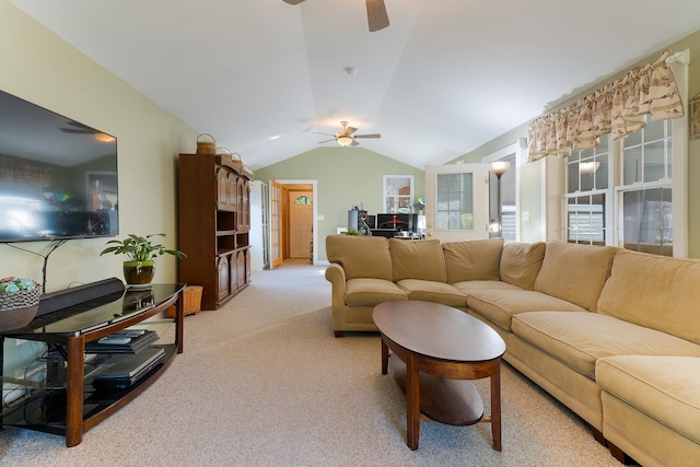 living room with vaulted ceiling, light carpet, and ceiling fan