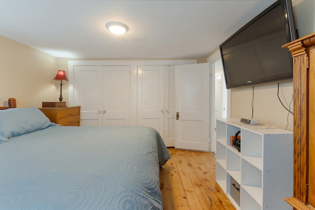 bedroom featuring light hardwood / wood-style floors