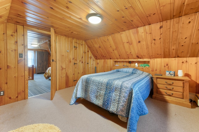 bedroom with lofted ceiling, wooden walls, carpet floors, and wooden ceiling