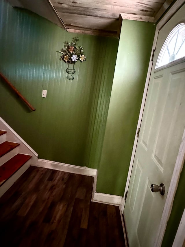 entrance foyer with wood ceiling and hardwood / wood-style flooring