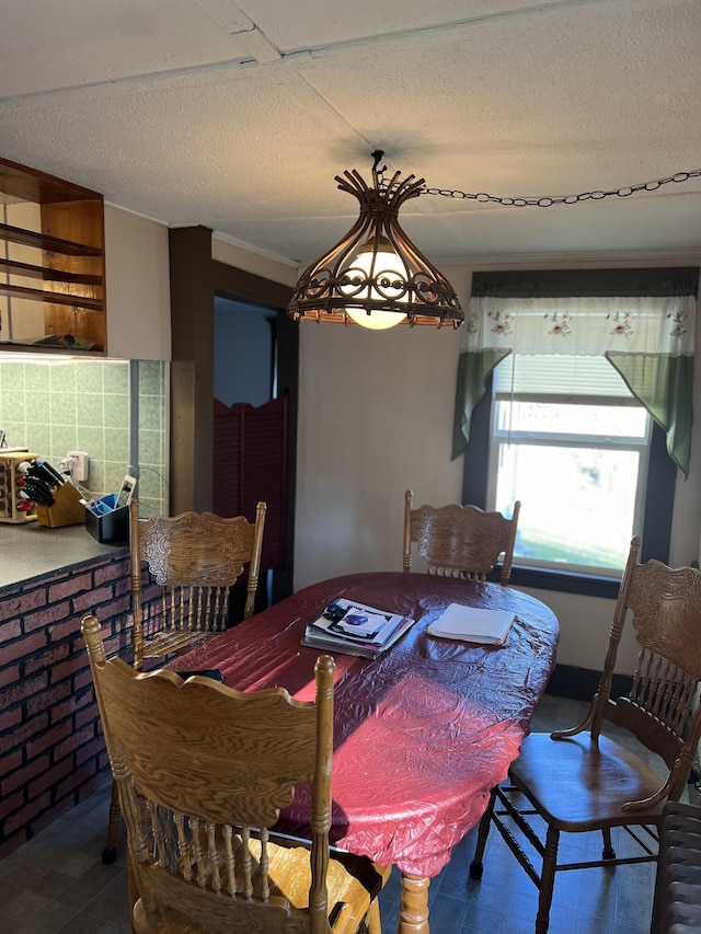 dining room with a textured ceiling