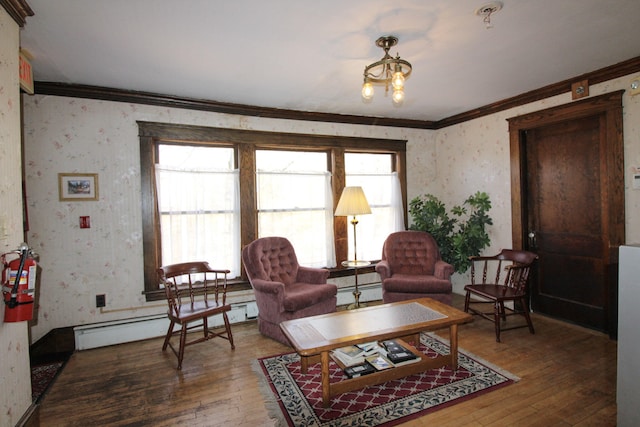 living room with crown molding, a healthy amount of sunlight, baseboard heating, and dark hardwood / wood-style flooring