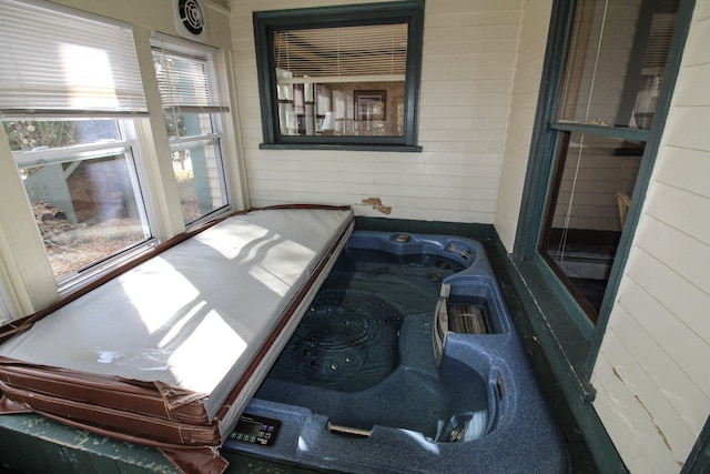 interior space featuring a hot tub