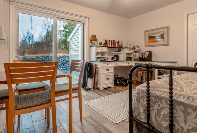 320 19th Ave Unit 101, Madawaska, ME 04756 - bedroom featuring light wood-style flooring and an office area