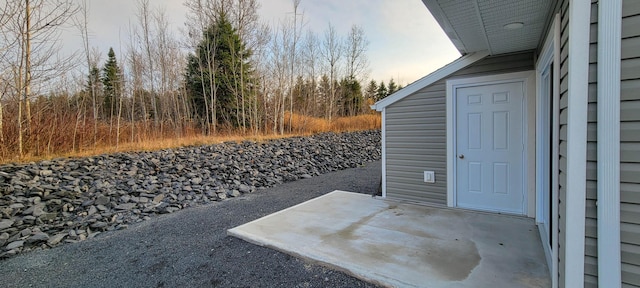 320 19th Ave Unit 101, Madawaska, ME 04756 - view of patio terrace at dusk
