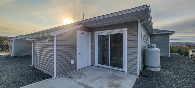 320 19th Ave Unit 101, Madawaska, ME 04756 - view of outdoor structure at dusk