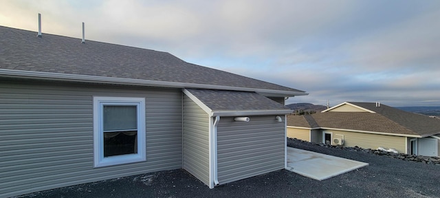 320 19th Ave Unit 101, Madawaska, ME 04756 - view of property exterior with roof with shingles